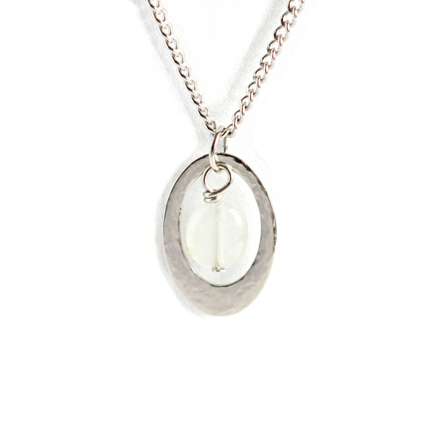 Oval stainless steel necklace with Aquamarine birthstone on white background.