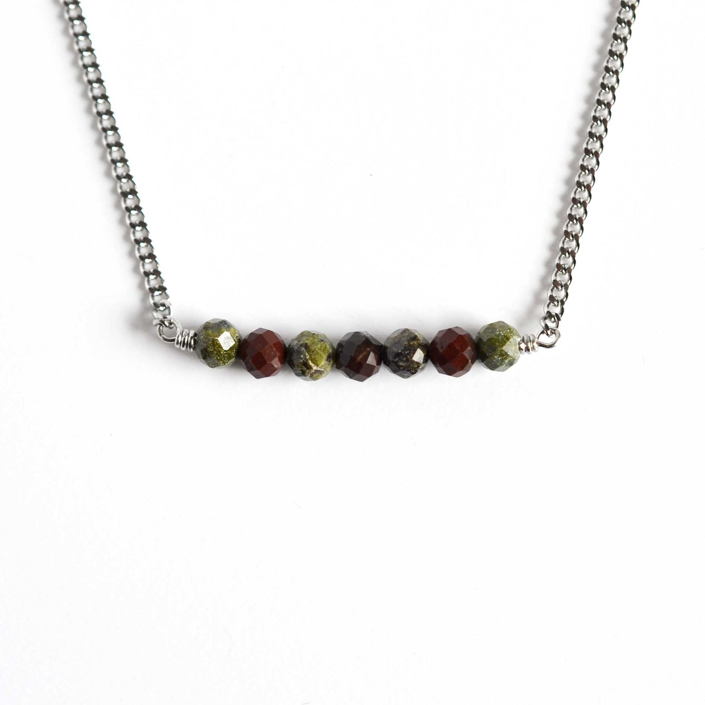Bloodstone necklace green stone and stainless steel chain on white background