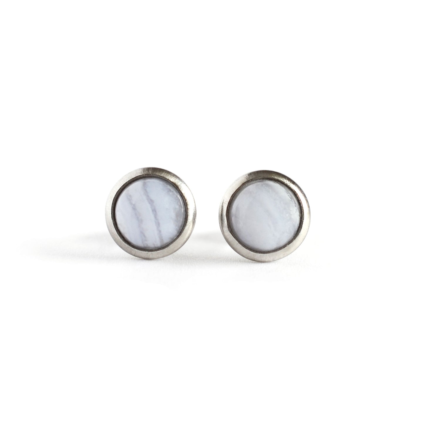 Front view of round Blue Lace Agate earrings on white background