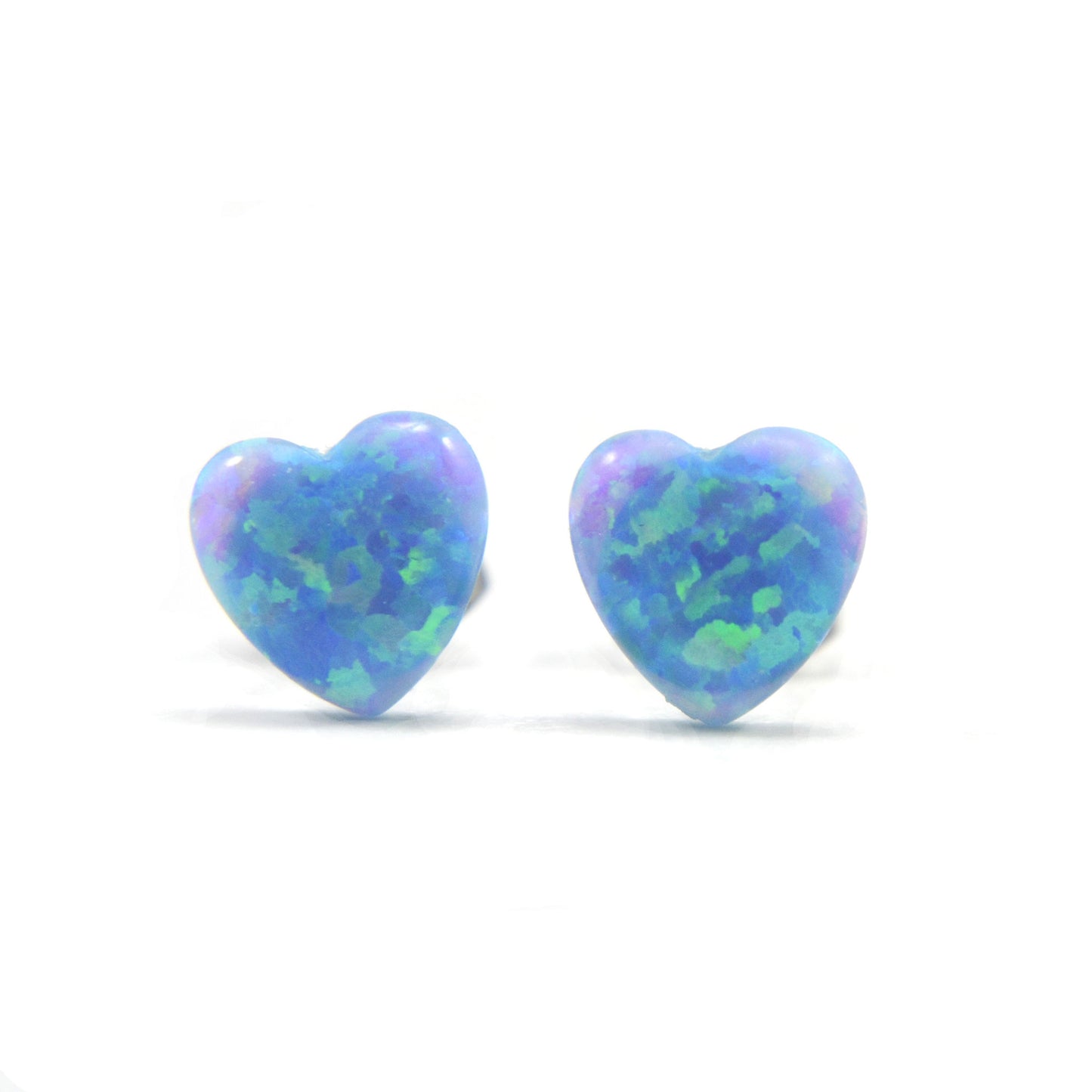 Blue opal heart earrings on white background
