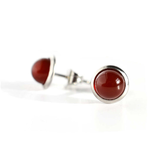 Round Carnelian earrings with surgical steel posts on white background