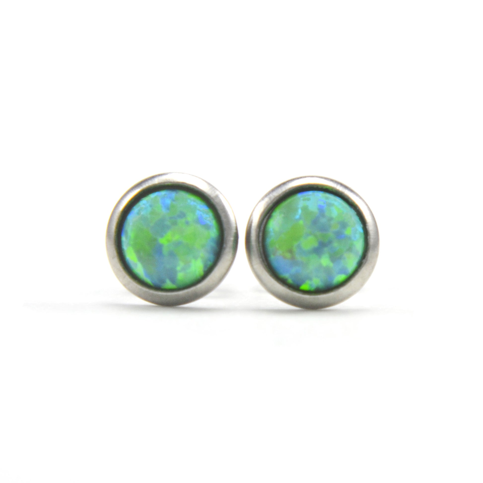 Front view of round lab created Green Opal stud earrings
