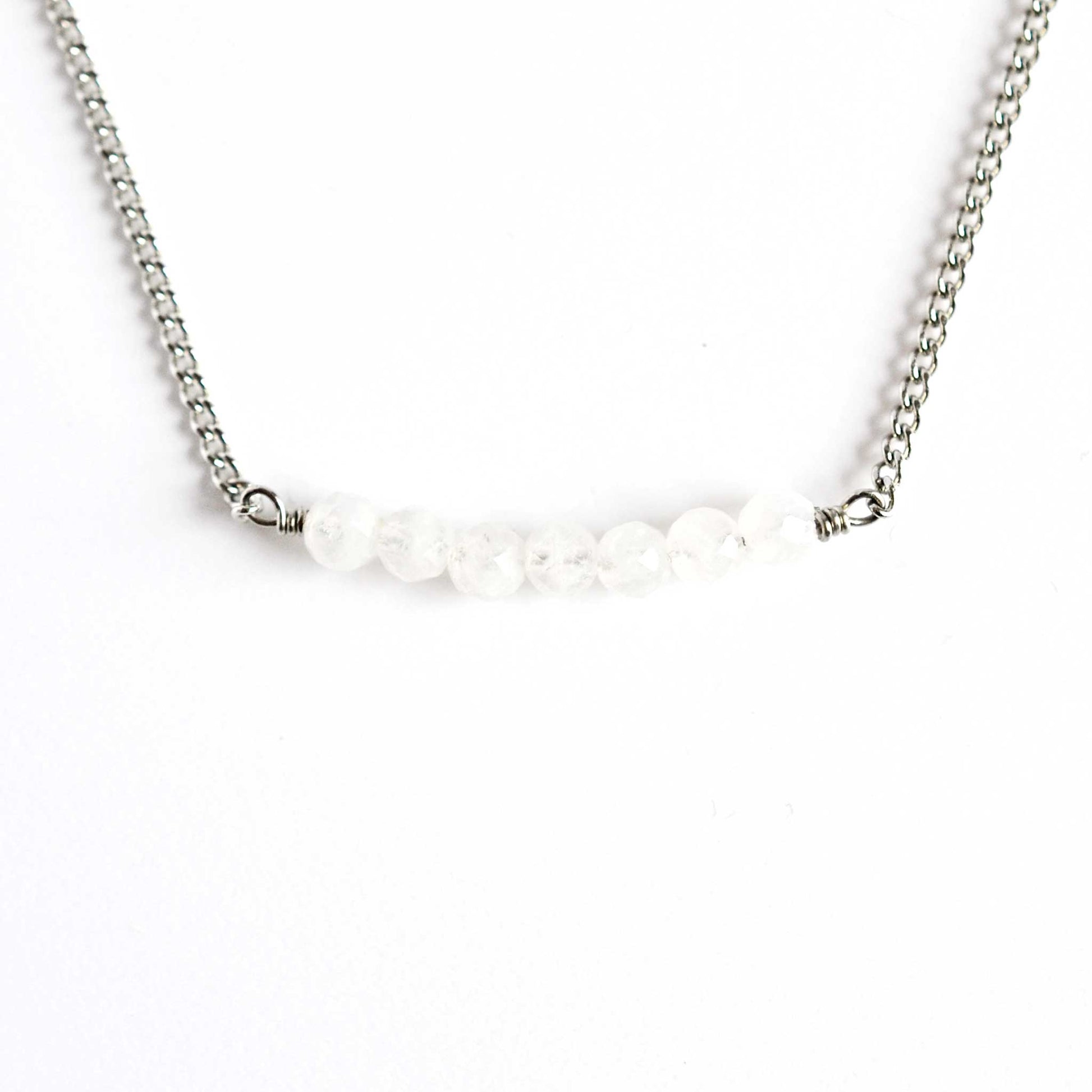 Rainbow Moonstone necklace with stainless steel chain on white background