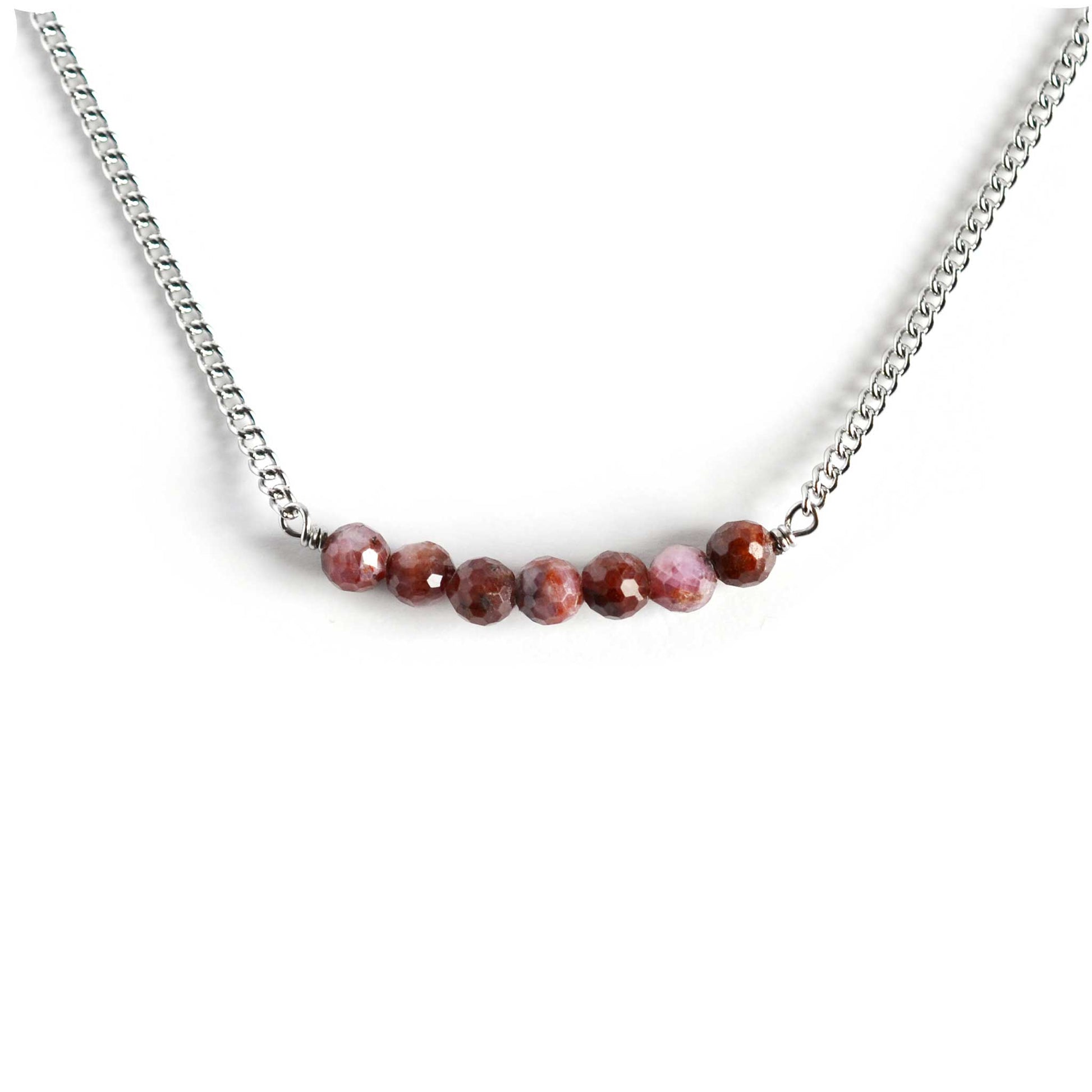 Ruby gemstone bar necklace on white background
