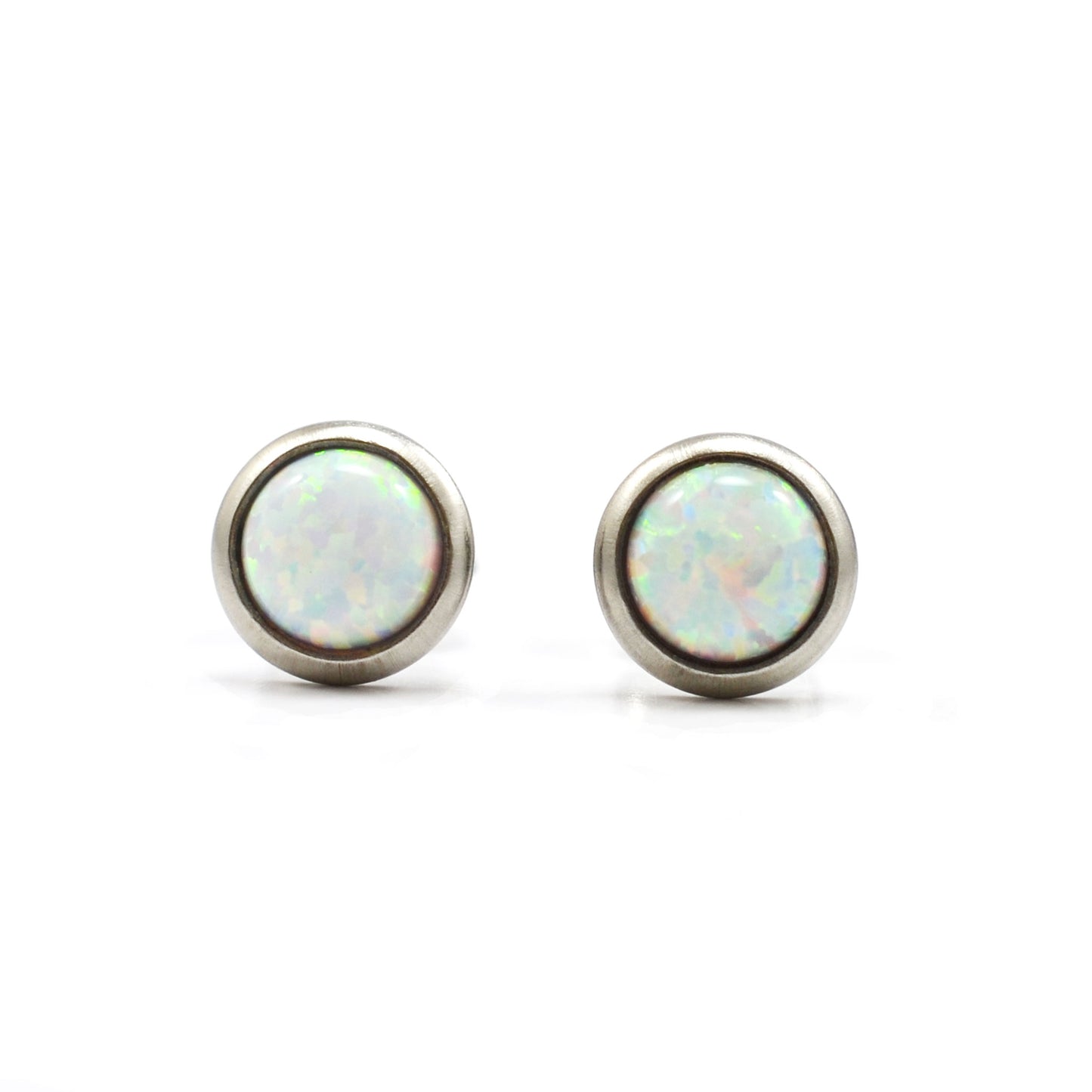 Front view of white lab Opal gemstone stud earrings